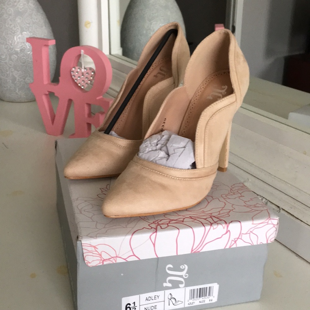 NWT in box. Beautiful nude suede pumps.
